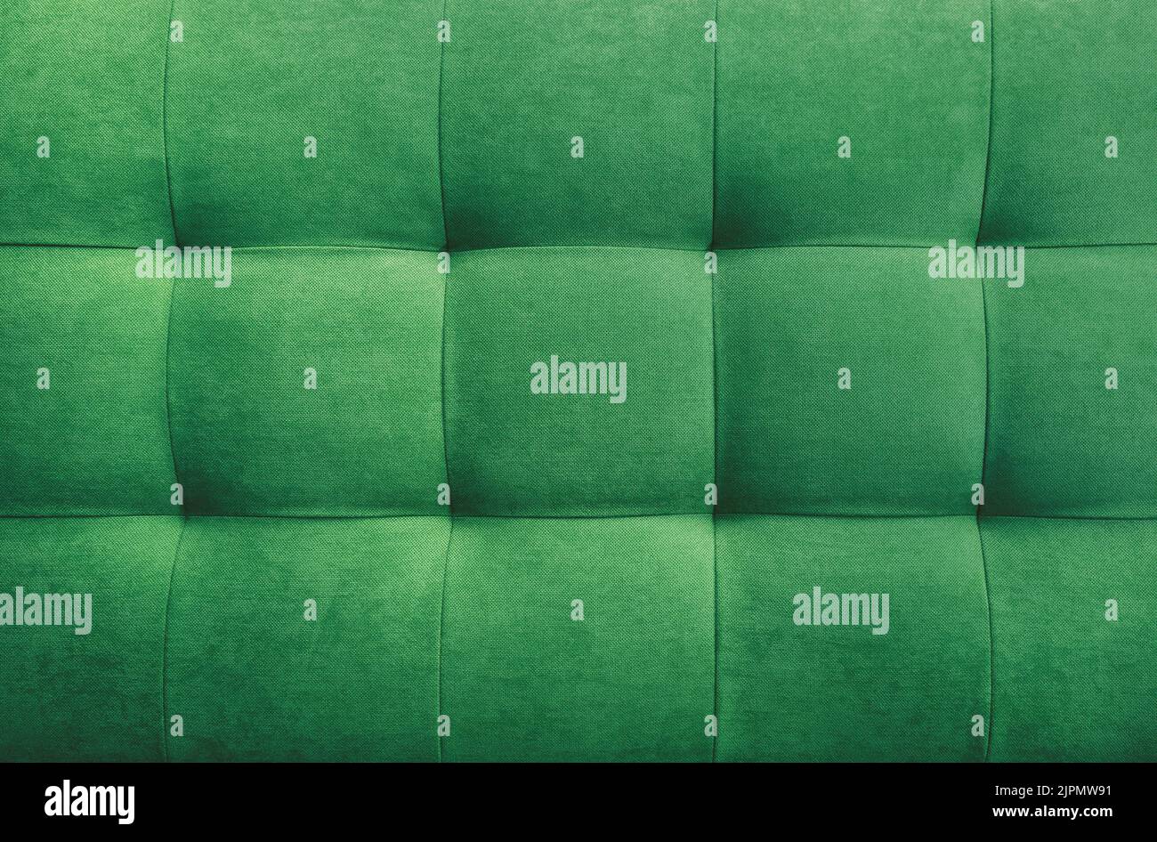 Green suede leather background for the wall in the room. Interior