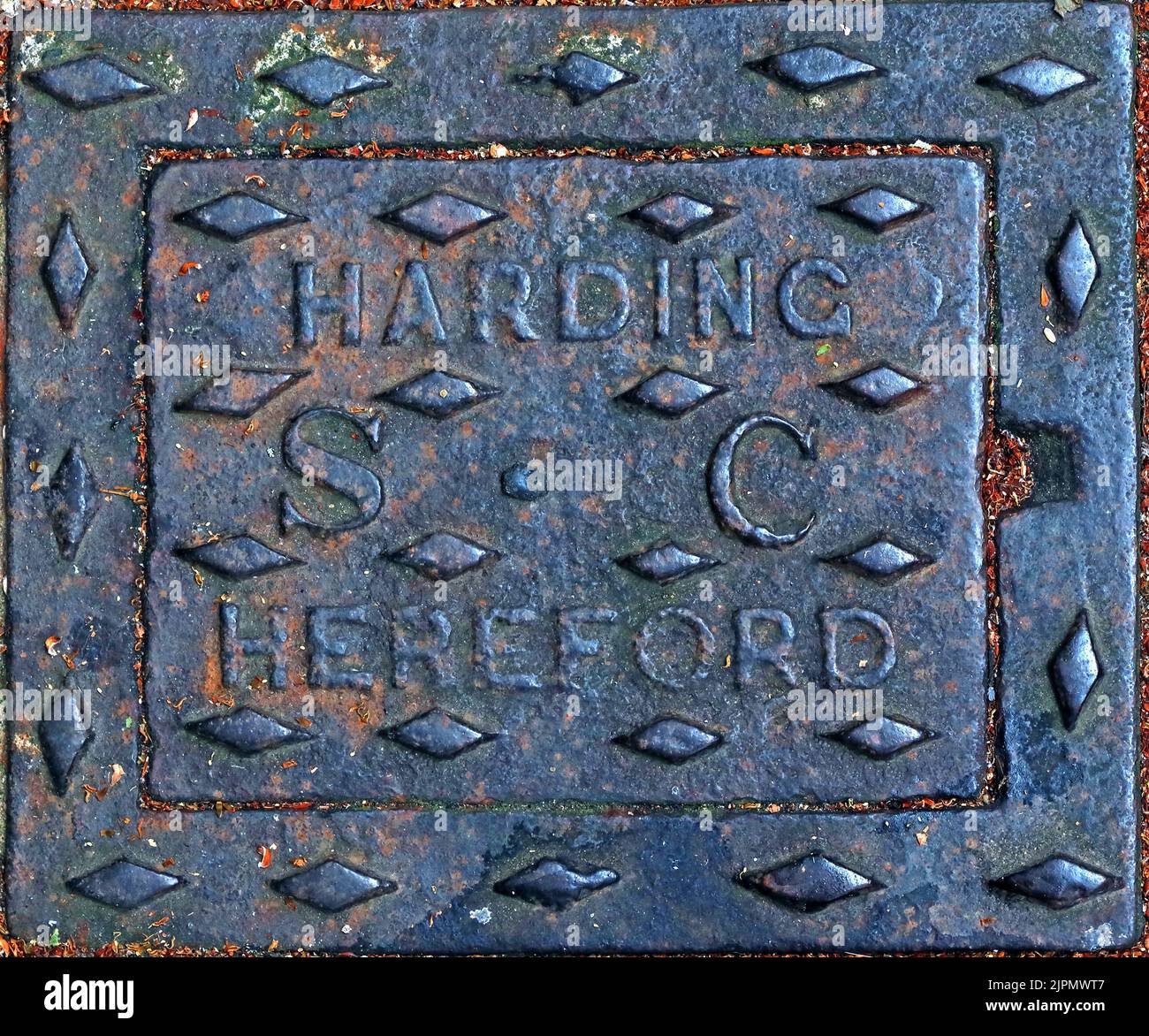 Harding Hereford cast iron embossed grid, sewage drain, Castle Street, Hereford, England, UK, HR1 2NL Stock Photo