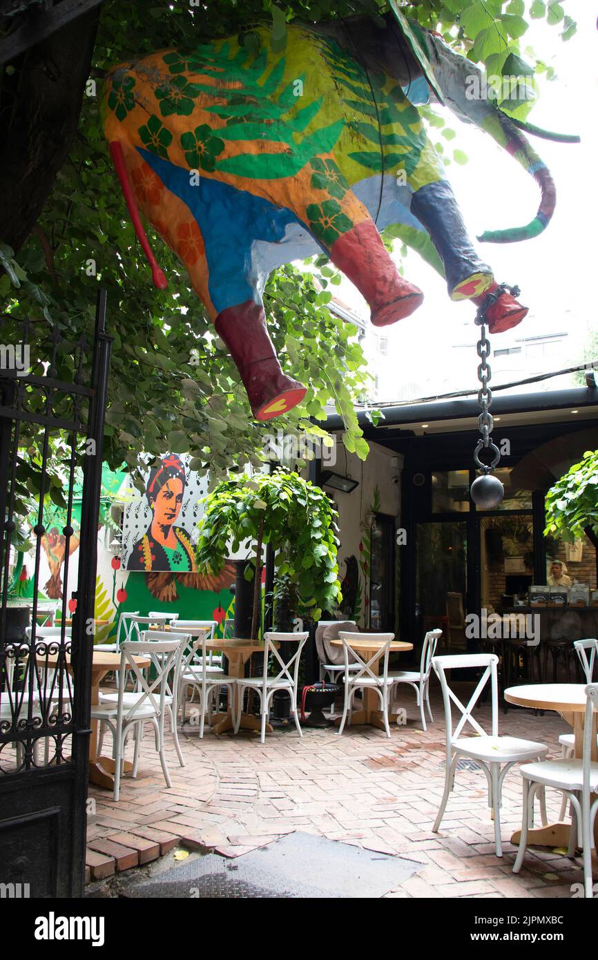 Belgrade-Serbia - May 28, 2022: Street coffee bar Blaznavac terrace cafe with chairs and tables in Dorcol - area full of bars and restaurants to go ou Stock Photo