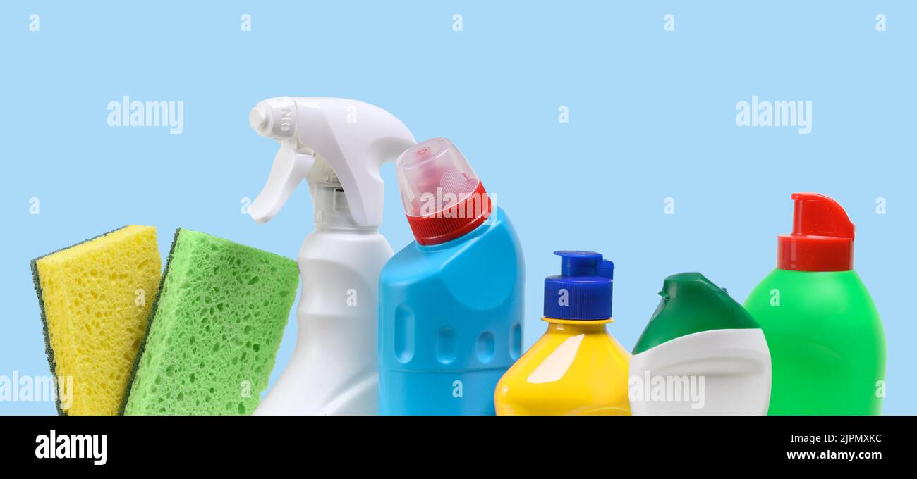 A plastic bottles with Household cleaning product on a blue background Stock Photo