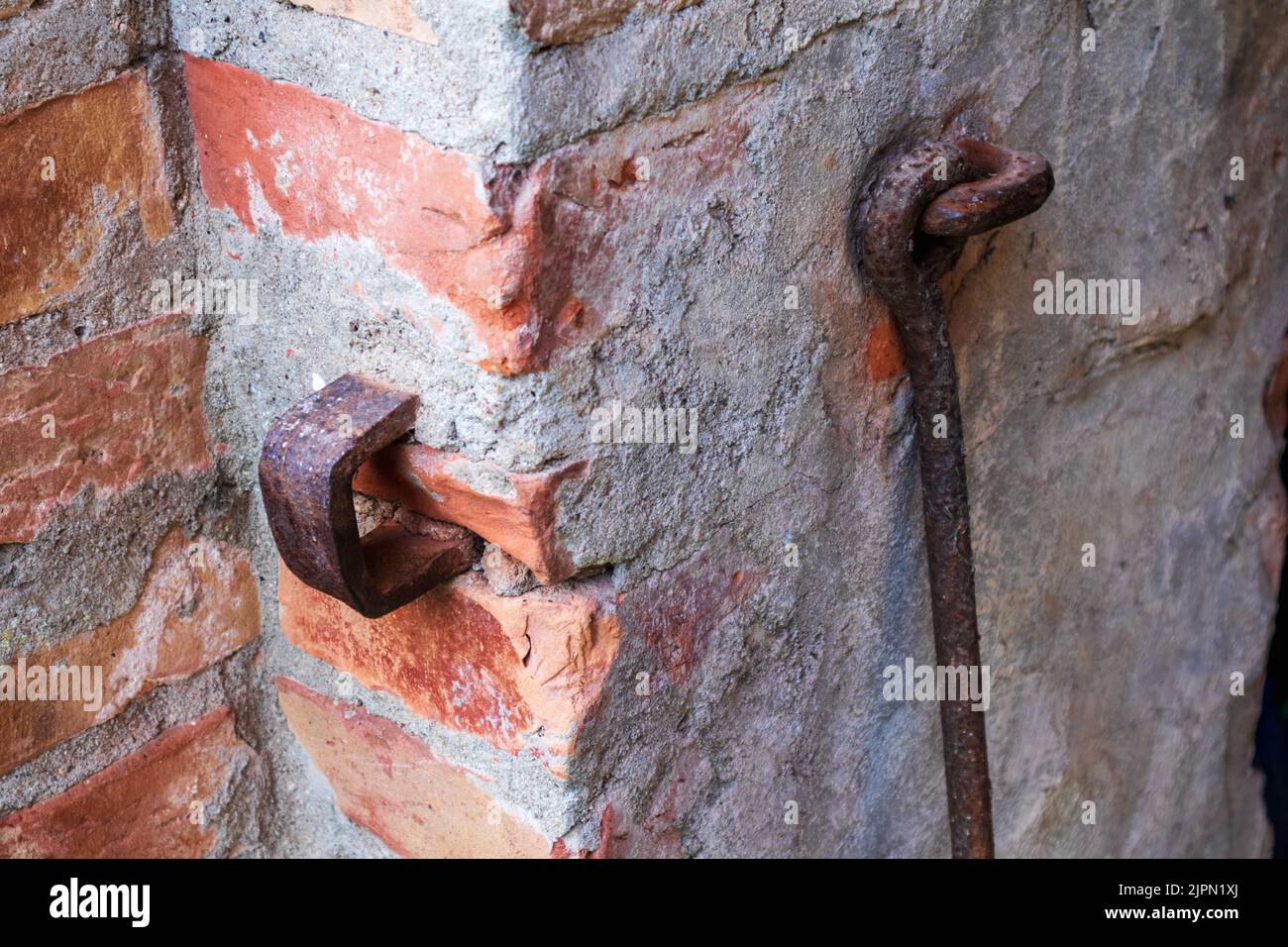 An old door jam stuck in the old orange colored bricks Stock Photo Alamy