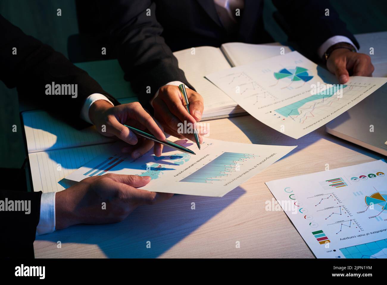 Professional financial analysts working with financial documents Stock Photo