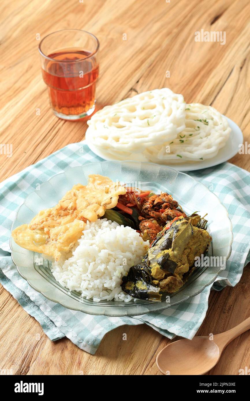 Nasi Rames or Nasi Campur, Mix Rice with Various Side Dish Stock Photo