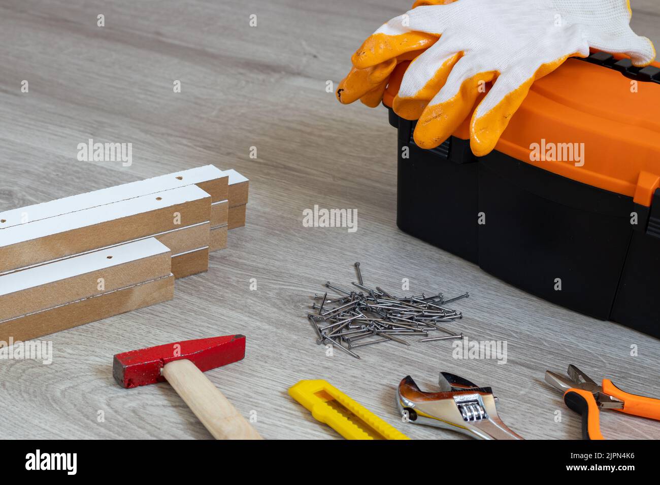 Toolbox With Various Work Tools On A Wooden Floor. Text copy space ...