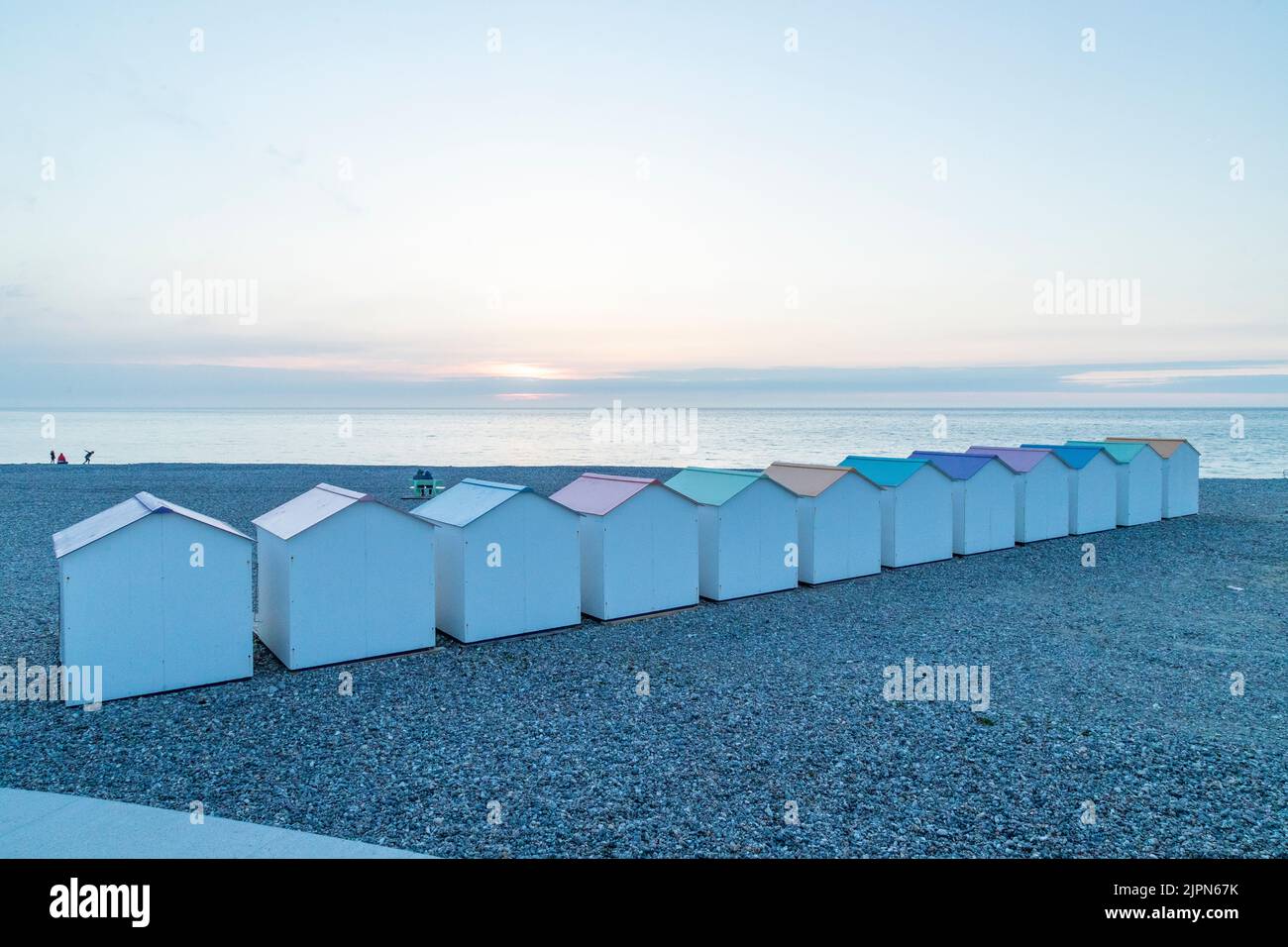 France, Seine Maritime, Cote d'Albatre, Le Treport, pebble beach and beach cabins in the evening // France, Seine Maritime (76), Côte d'Albatre, Le Tr Stock Photo