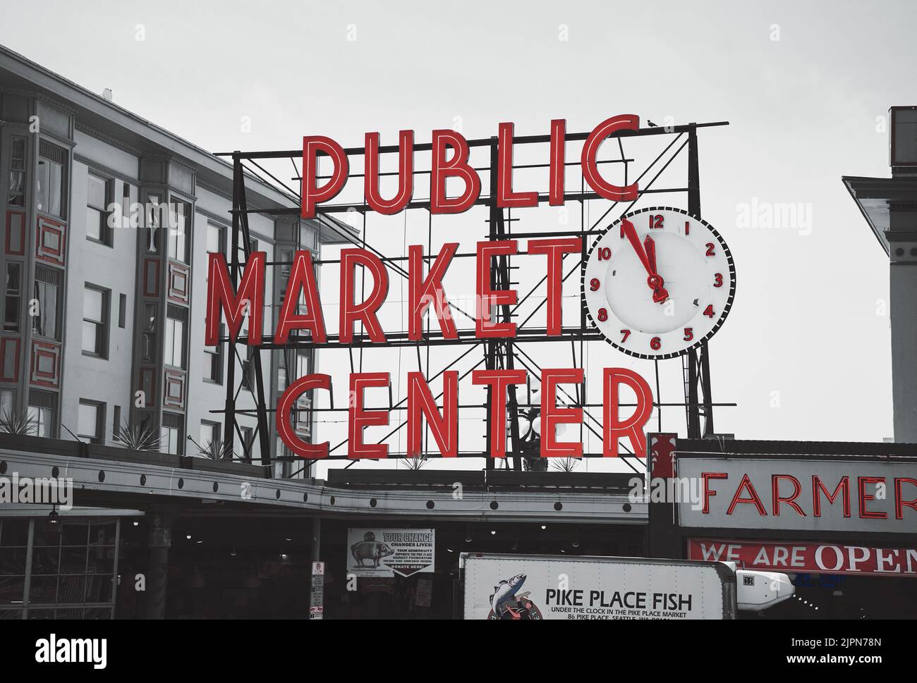 A Pikes Place market sign on the building in downtown Stock Photo