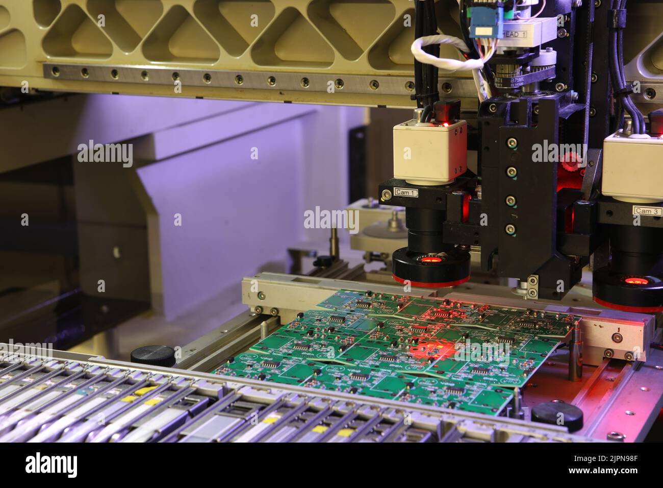 Installer of SMD parts on boards and soldering parts. Machine for