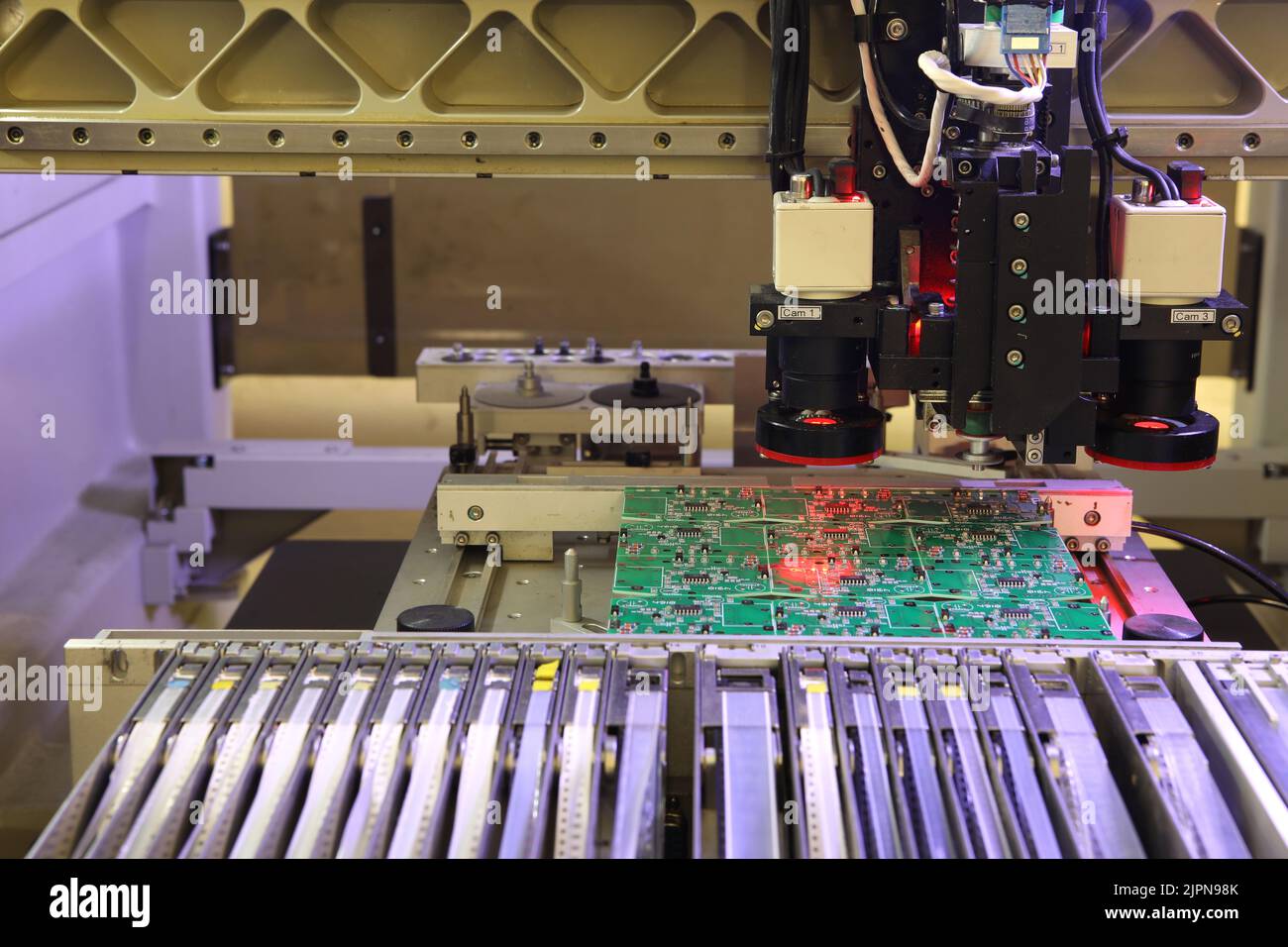 Installer of SMD parts on boards and soldering parts. Machine for