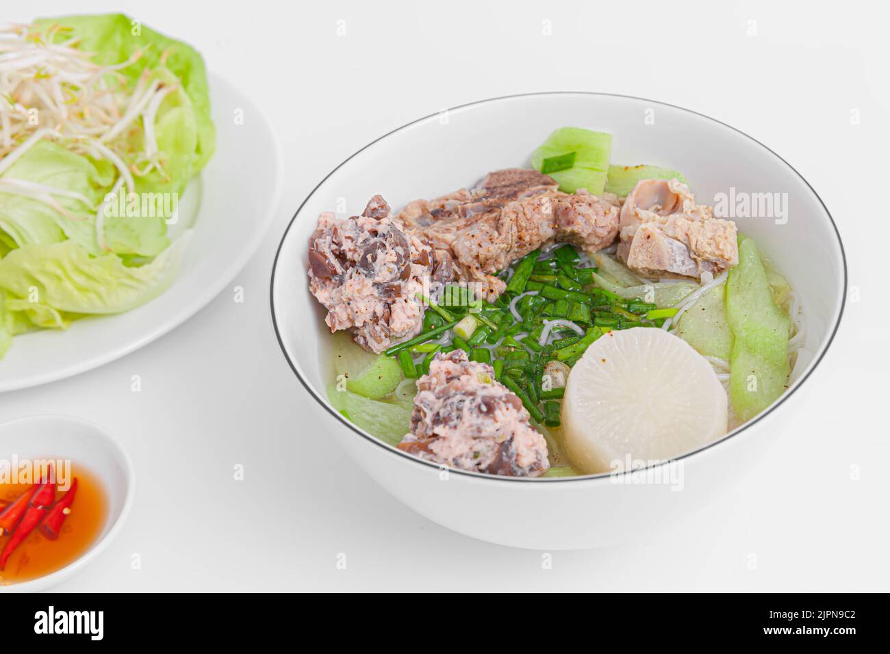 Bun Moc, Rice noodle soup with pork ball, Vietnamese food isolated on white background, close-up Stock Photo