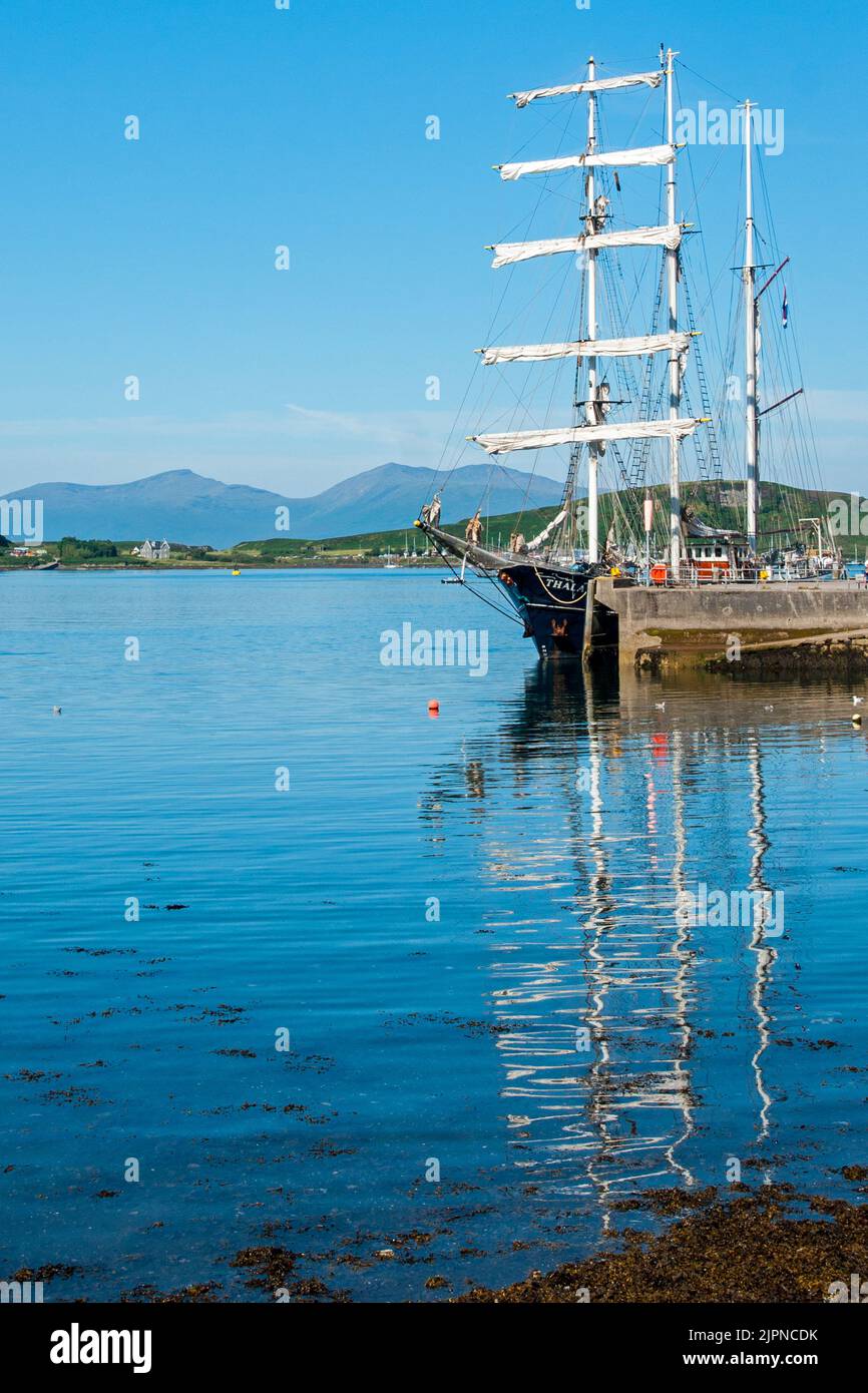 Barquentine-rigged tall ship Thalassa visiting Oban, Argyll and Bute, Scotland Stock Photo