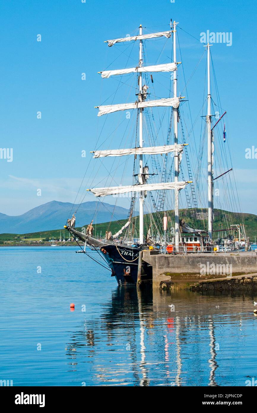 Barquentine-rigged tall ship Thalassa visiting Oban, Argyll and Bute, Scotland Stock Photo