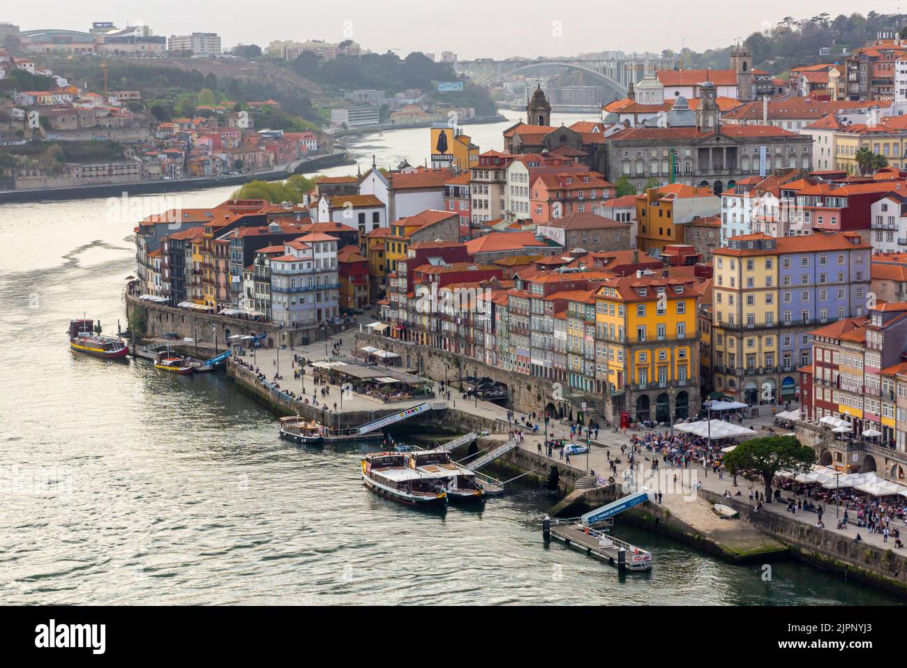 Tourist boats moored on the River Douro in the centre of Porto a major city in northern Portugal. Stock Photo