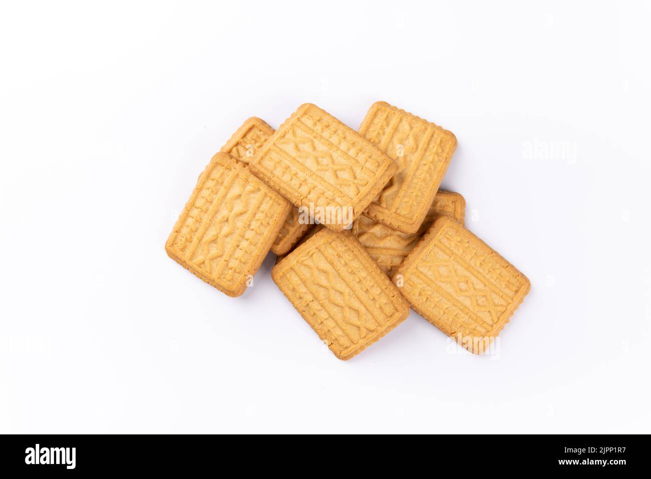 pile of sweet wheat flour cookies on a white background Stock Photo Alamy