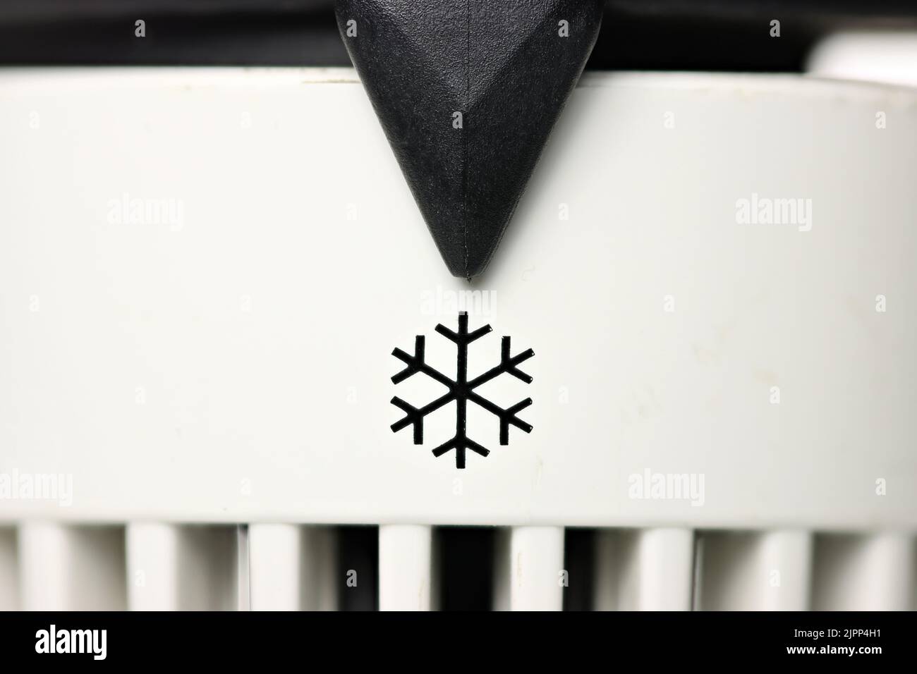 thermostatic radiator valve at frost protection position Stock Photo