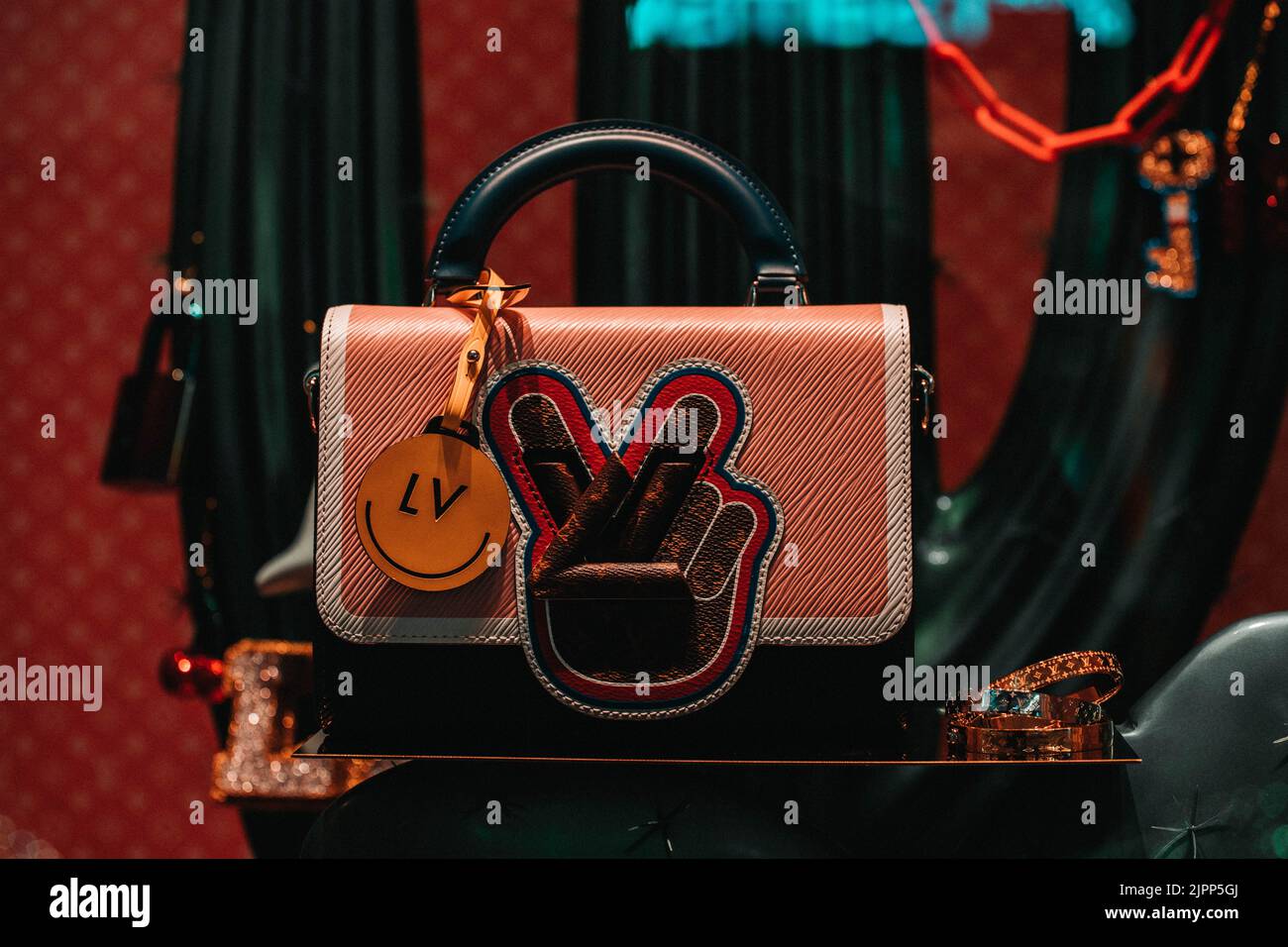 Louis vuitton bag woman hi-res stock photography and images - Alamy
