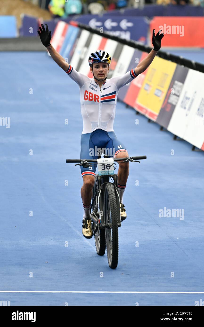 British Tom Pidcock of Ineos Grenadiers celebrates after winning the men cross country race of the Mountainbike VTT event on the ninth day of the Athletics European Championships at Munich 2022 German...