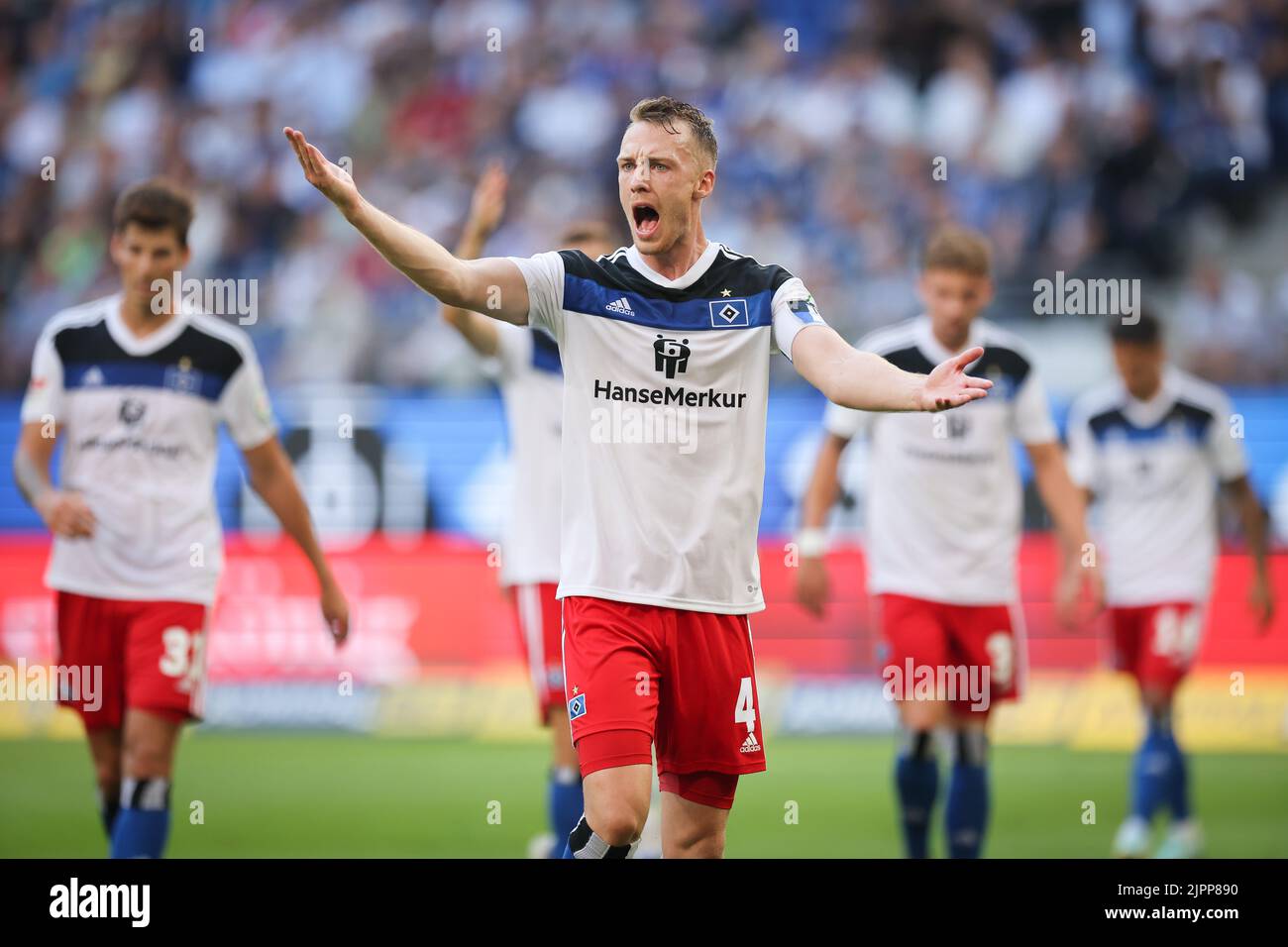 Hamburg, Germany. 19th Aug, 2022. Soccer: 2nd Bundesliga, Matchday 5, Hamburger SV - Darmstadt 98 at Volksparkstadion. Hamburg's Sebastian Schonlau gestures on the pitch. Credit: Christian Charisius/dpa - IMPORTANT NOTE: In accordance with the requirements of the DFL Deutsche Fußball Liga and the DFB Deutscher Fußball-Bund, it is prohibited to use or have used photographs taken in the stadium and/or of the match in the form of sequence pictures and/or video-like photo series./dpa/Alamy Live News Stock Photo