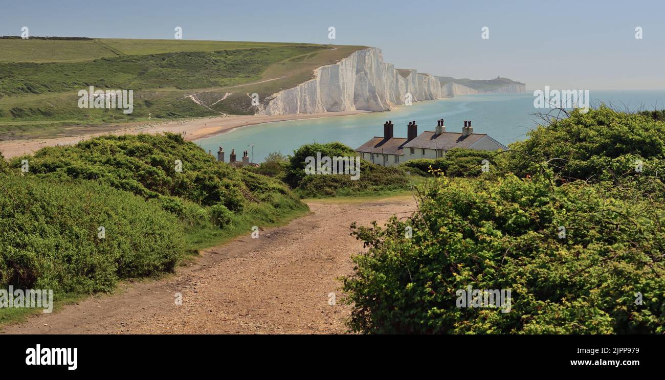 The Seven Sisters chalk cliffs and country park, seen from the opposite side of the Cuckmere river. Stock Photo