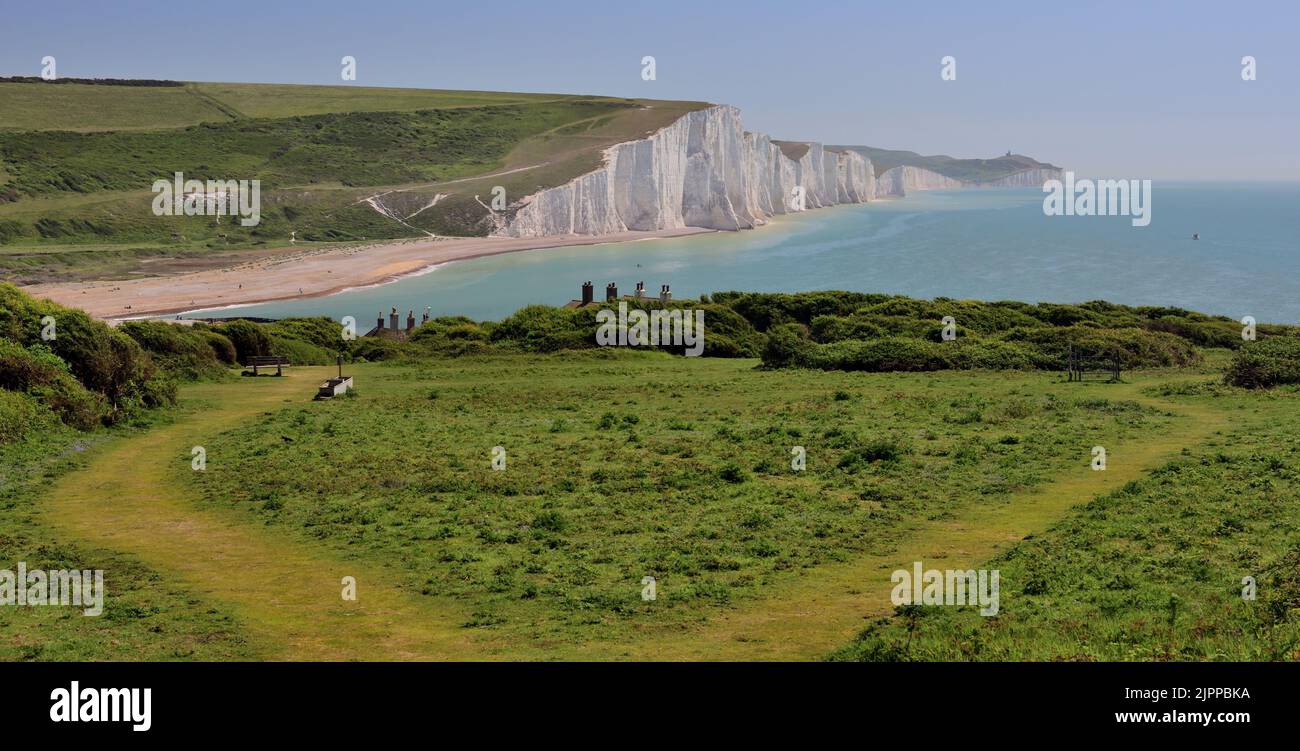 The Seven Sisters chalk cliffs and country park, seen from the opposite side of the Cuckmere river. Stock Photo