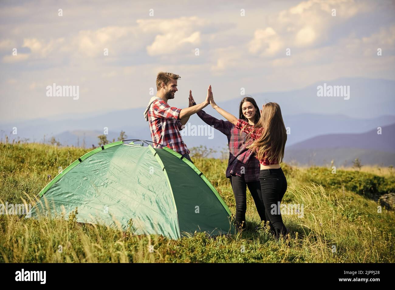 Well done. Camping gear. Camping tent. Good job. Teamwork concept