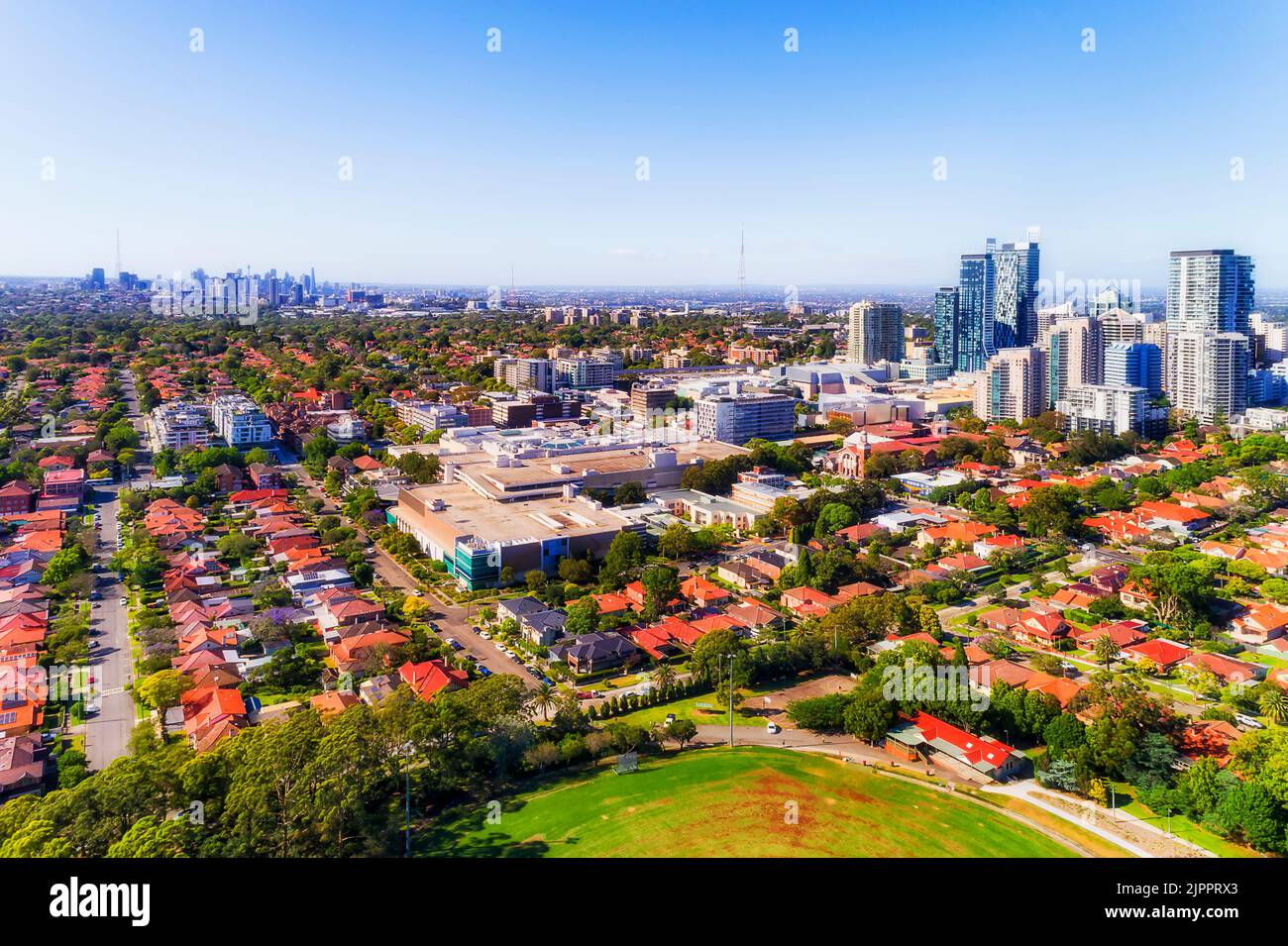 Residential suburbs of Lower North shore in Sydney city - Chatswood business district and local streets in aerial view to CBD. Stock Photo