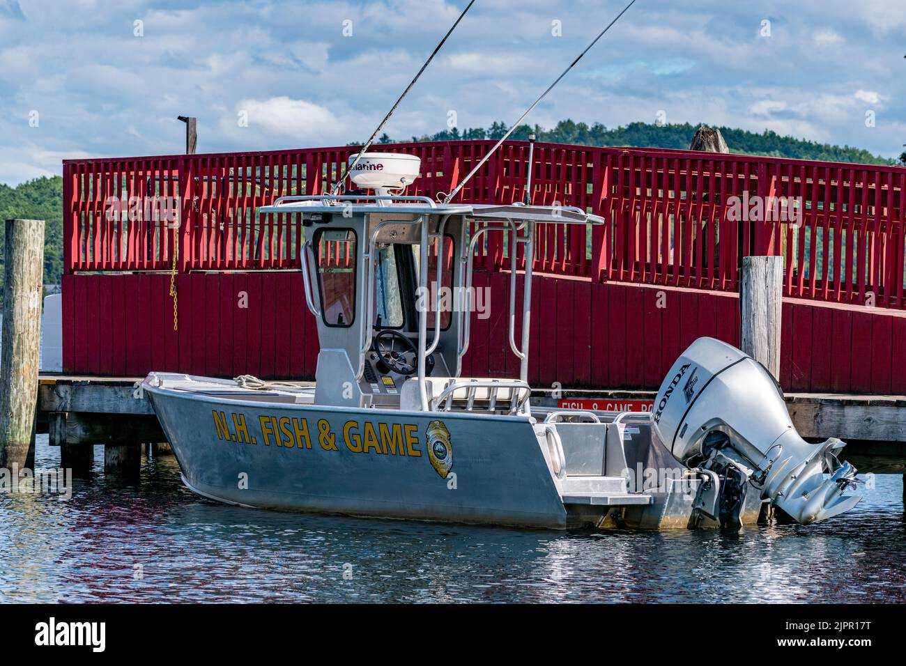 A New Hampshire Fish & Game boat is docked on Lake Winnipesaukee in Meredith, Belknap County, New Hampshire. Stock Photo