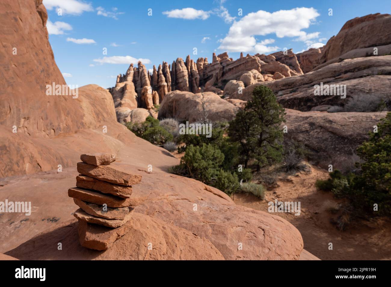 Rock Cairn Marking A Sand Stone Trail In Arches National Park Stock Photo