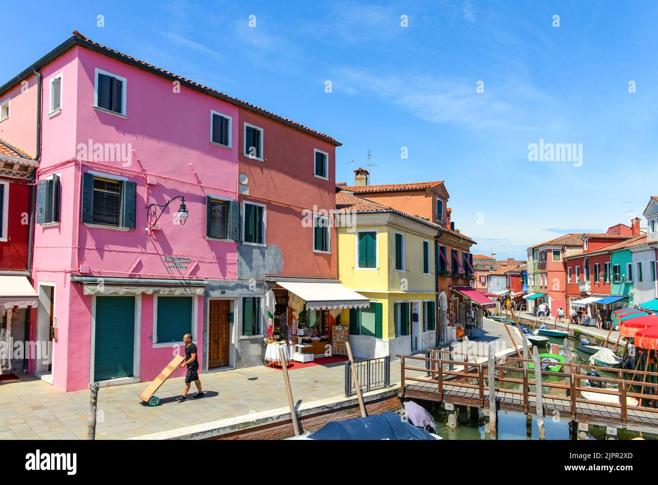 BURANO ISLAND, VENICE, ITALY JULY 4, 2022 Tourists among the