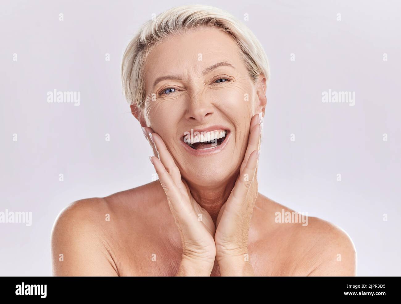 Botox, menopause and anti aging woman in beauty, skincare or face wash portrait in a studio. Plastic surgery, dermatology or cosmetics senior model Stock Photo