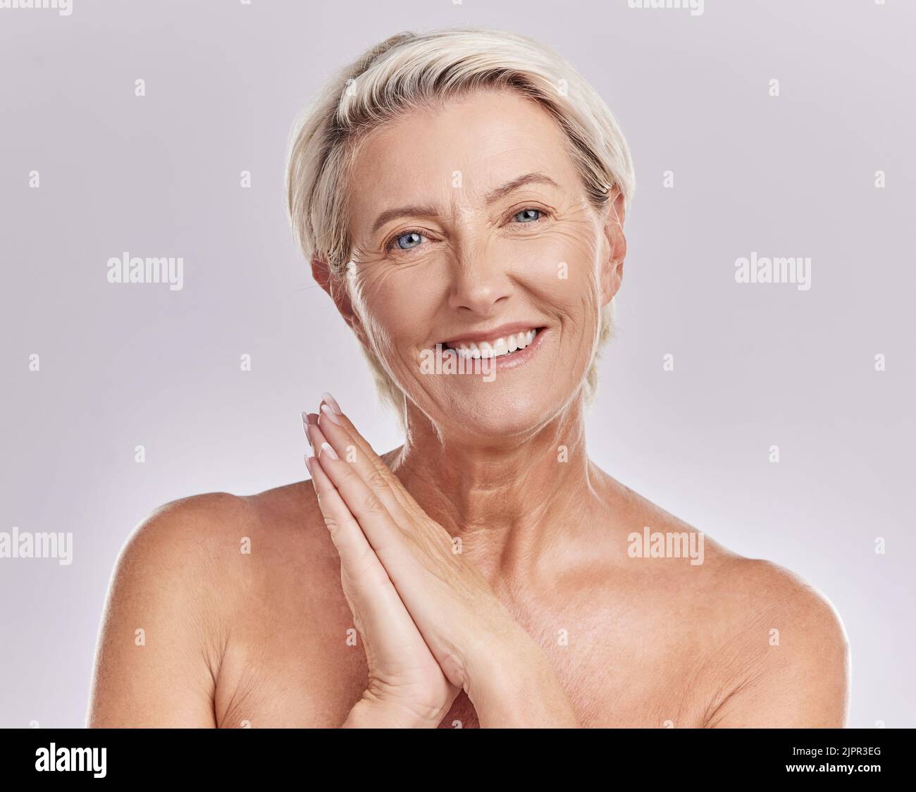 Soft skin, antiaging or wrinkle free senior woman looking happy with her skincare, hygiene and beauty nighttime or bedtime routine. Beautiful Stock Photo