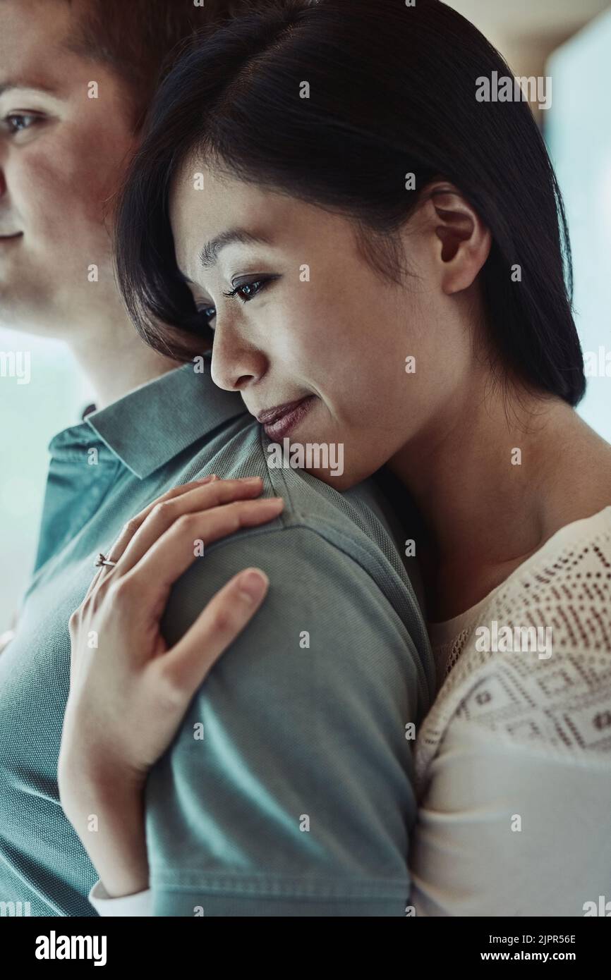 This is my shoulder to lean on. an attractive young woman embracing her
