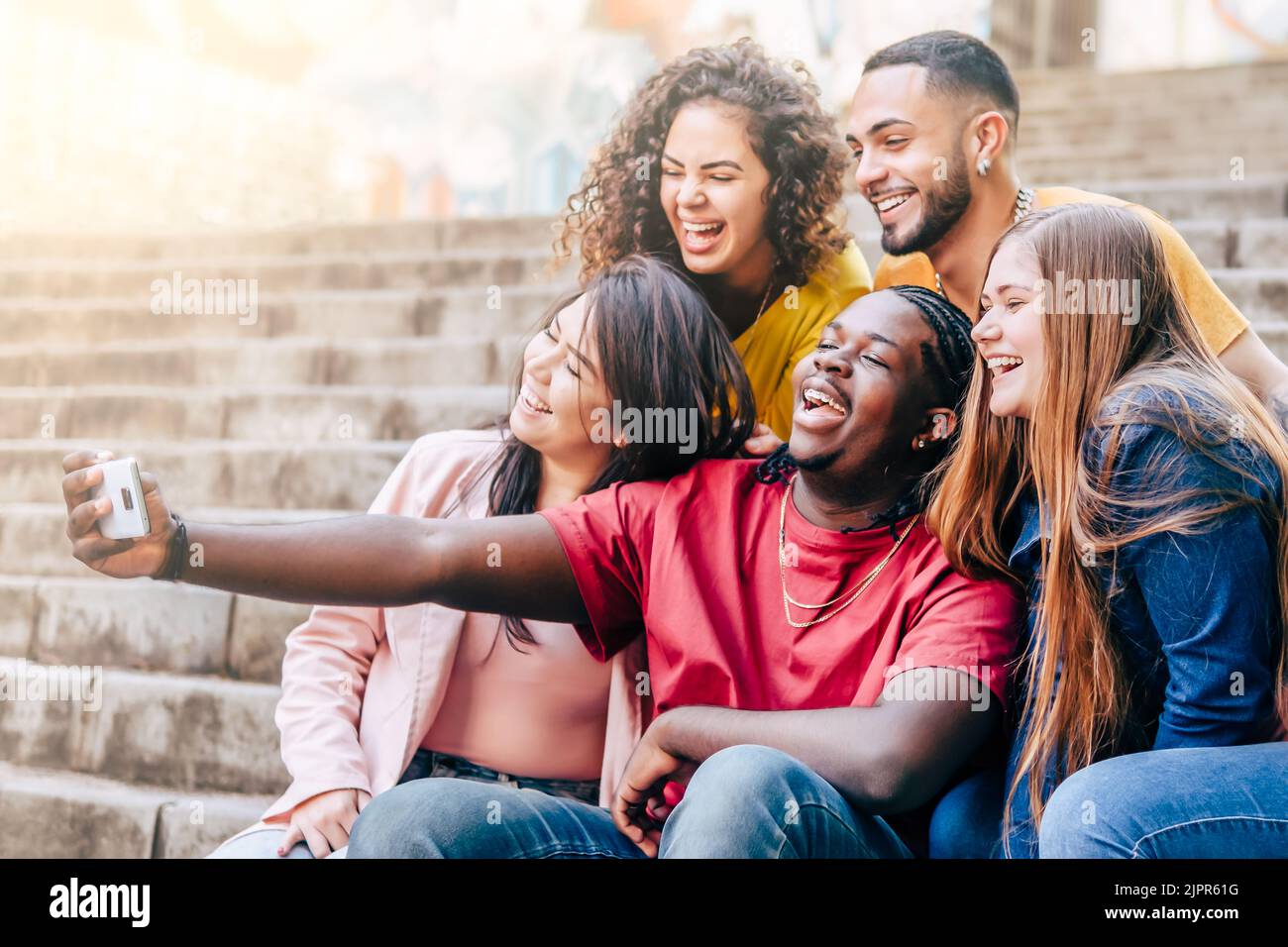 Multiracial teenagers having fun hi-res stock photography and
