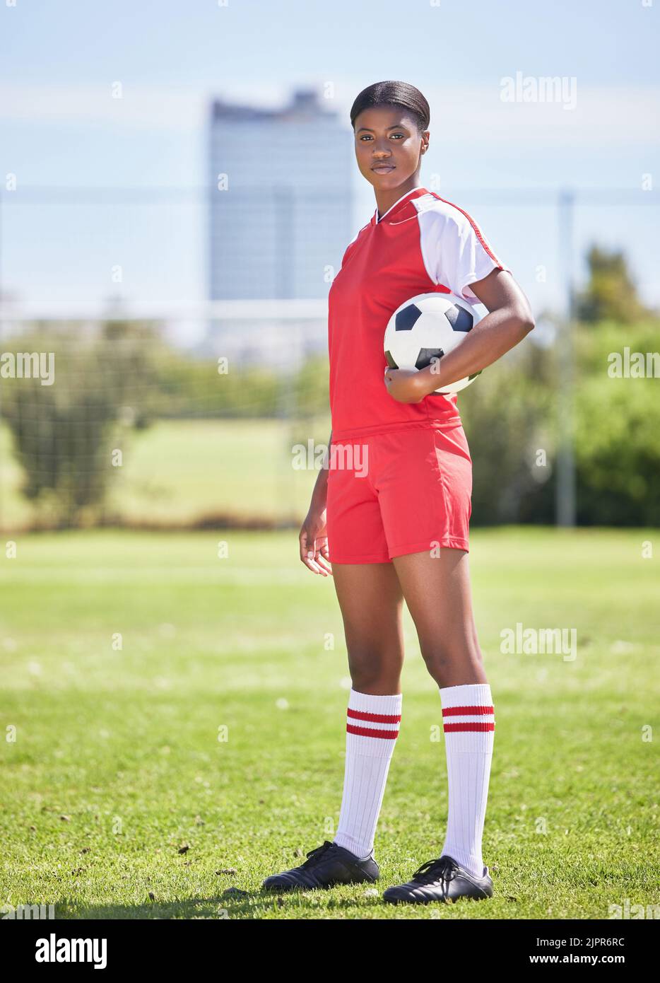 Woman playing football soccer sport hires stock photography and images