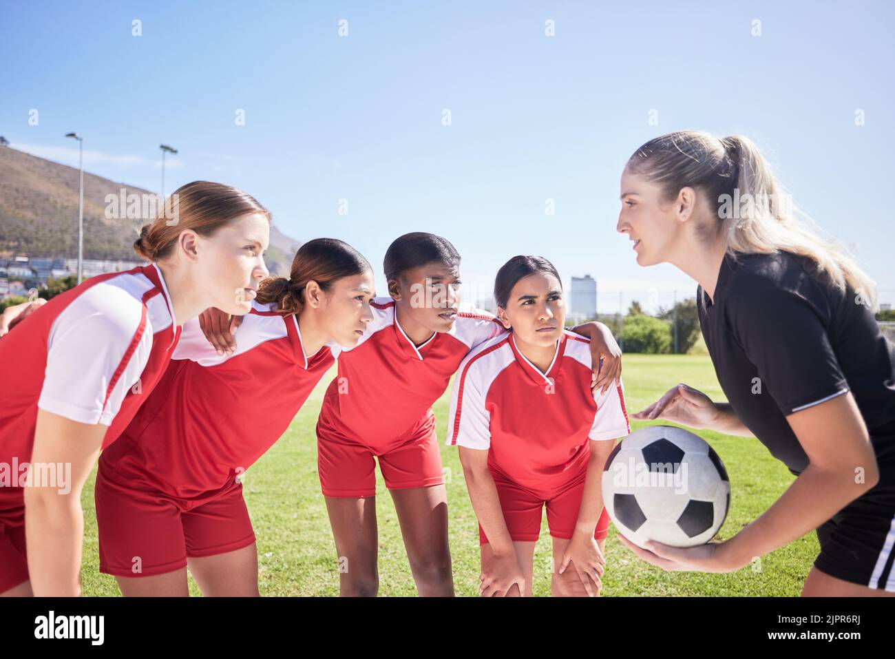 Sports, soccer players and football coach giving women motivation to