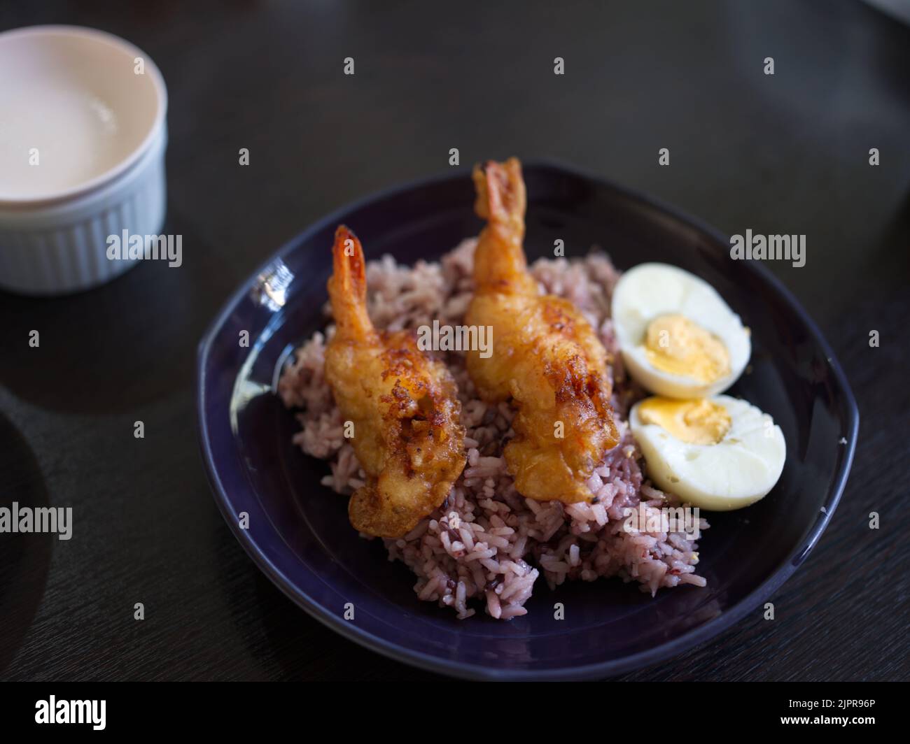 Deep-fried breaded shrimp or fried prawn balls with boil egg . THAI