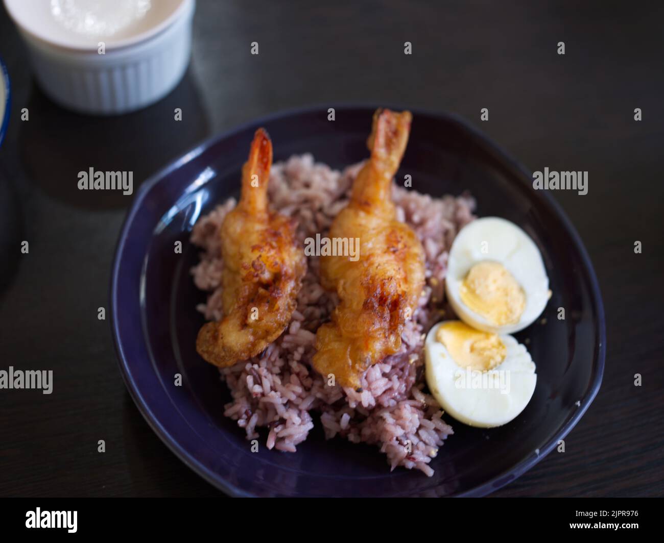 Deep-fried breaded shrimp or fried prawn balls with boil egg . THAI