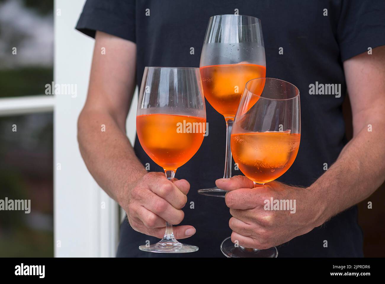 Three glasses of Aperol Spritz are served, Mecklenburg-Vorpommern, Germany Stock Photo