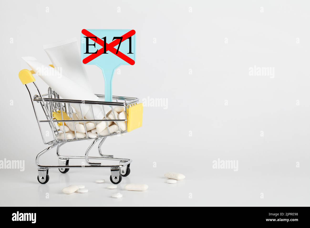 Titanium dioxide, E171, dangerous additive concept. gum, pills