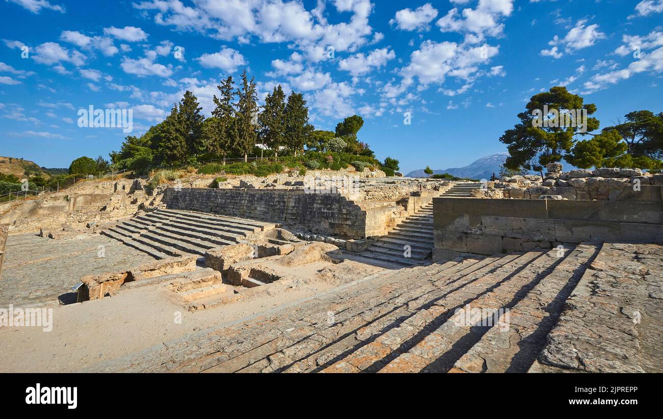 Super wide angle, open stairs, morning light, blue sky, white clouds, trees, Minoan palace of Festos, Messara plain, central Crete, island of Crete, G Stock Photo