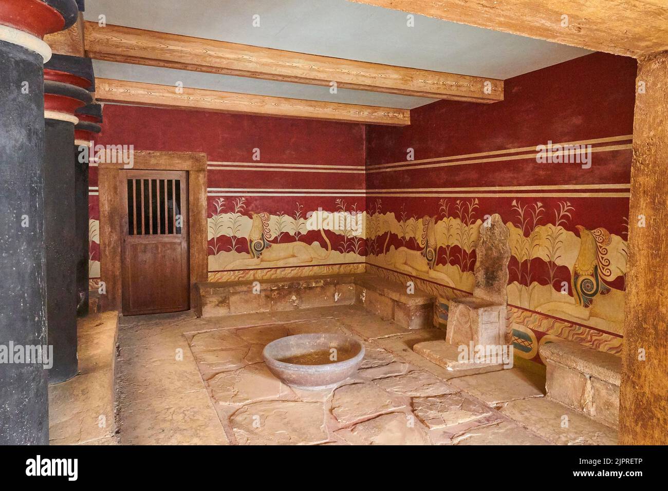 Throne room, griffin frescoes, throne, porphyry basin, black round columns, wooden door, Palace of Knossos, Heraklion, Central Crete, Island of Stock Photo