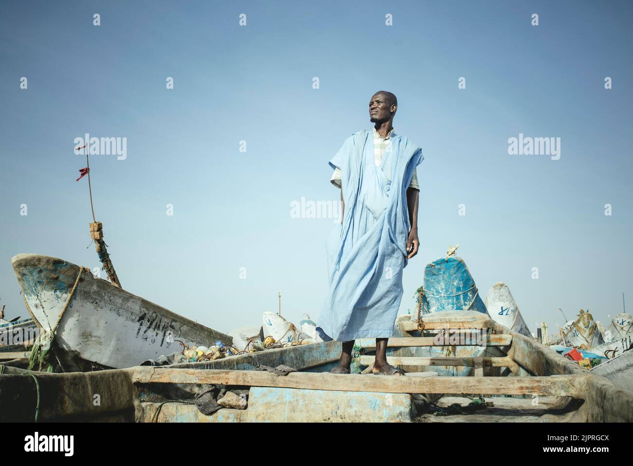 Fisherman Kabir Sidi M'Barek on his boat, Nouadhibou, Mauritania Stock Photo