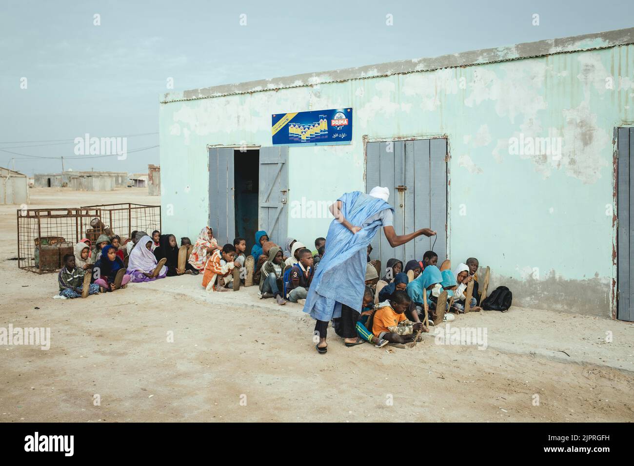 Children in the early morning at the Koran school, fishing village Nouamghar, Mauritania Stock Photo