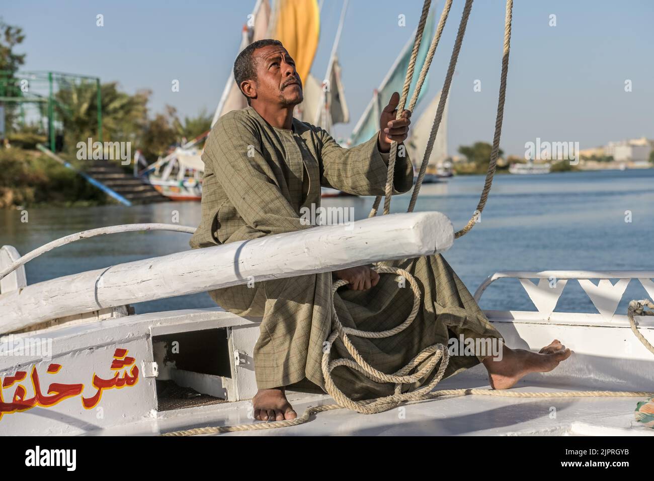 Boatswain, Captain, Sailboat, Felucca, Nile, Luxor, Egypt Stock Photo