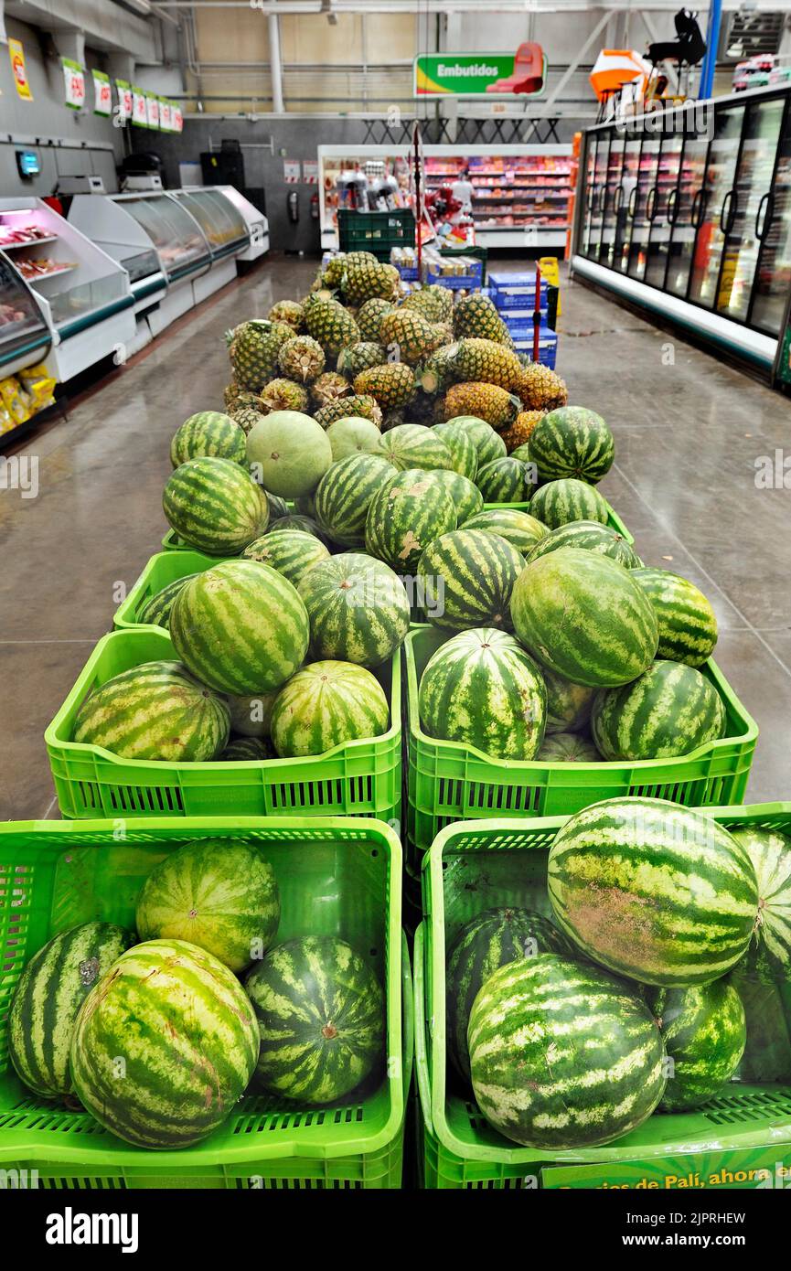 Supermarket with melons and pineapples near Puntarenas, Costa Rica, Central America Stock Photo