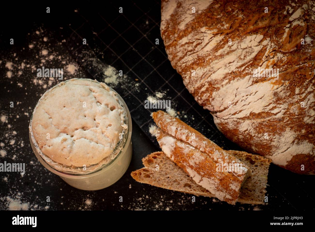 Loaf of artisan wheat and rye bread with graham flour. Sourdough