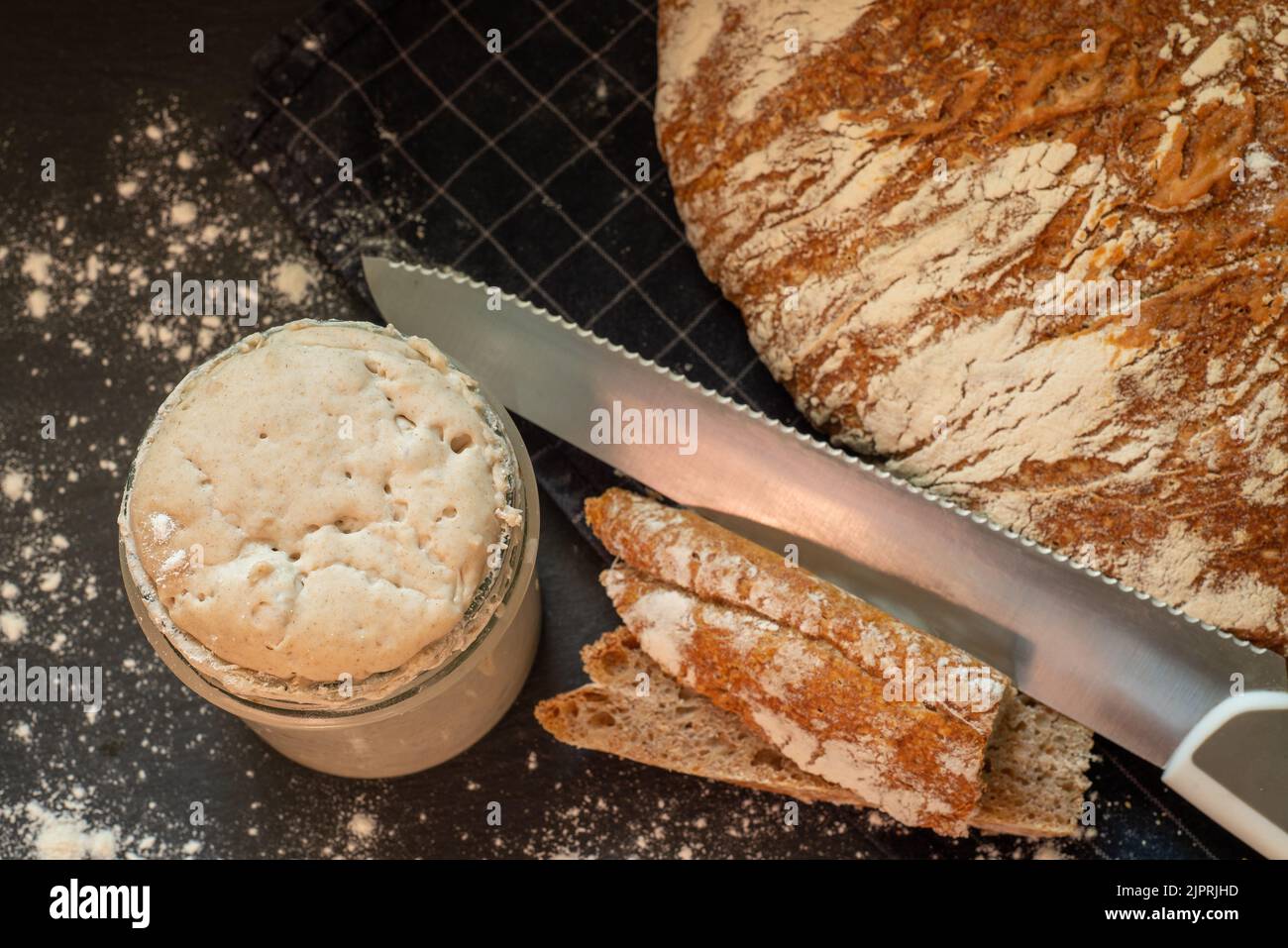 Loaf of artisan wheat and rye bread with graham flour. Sourdough