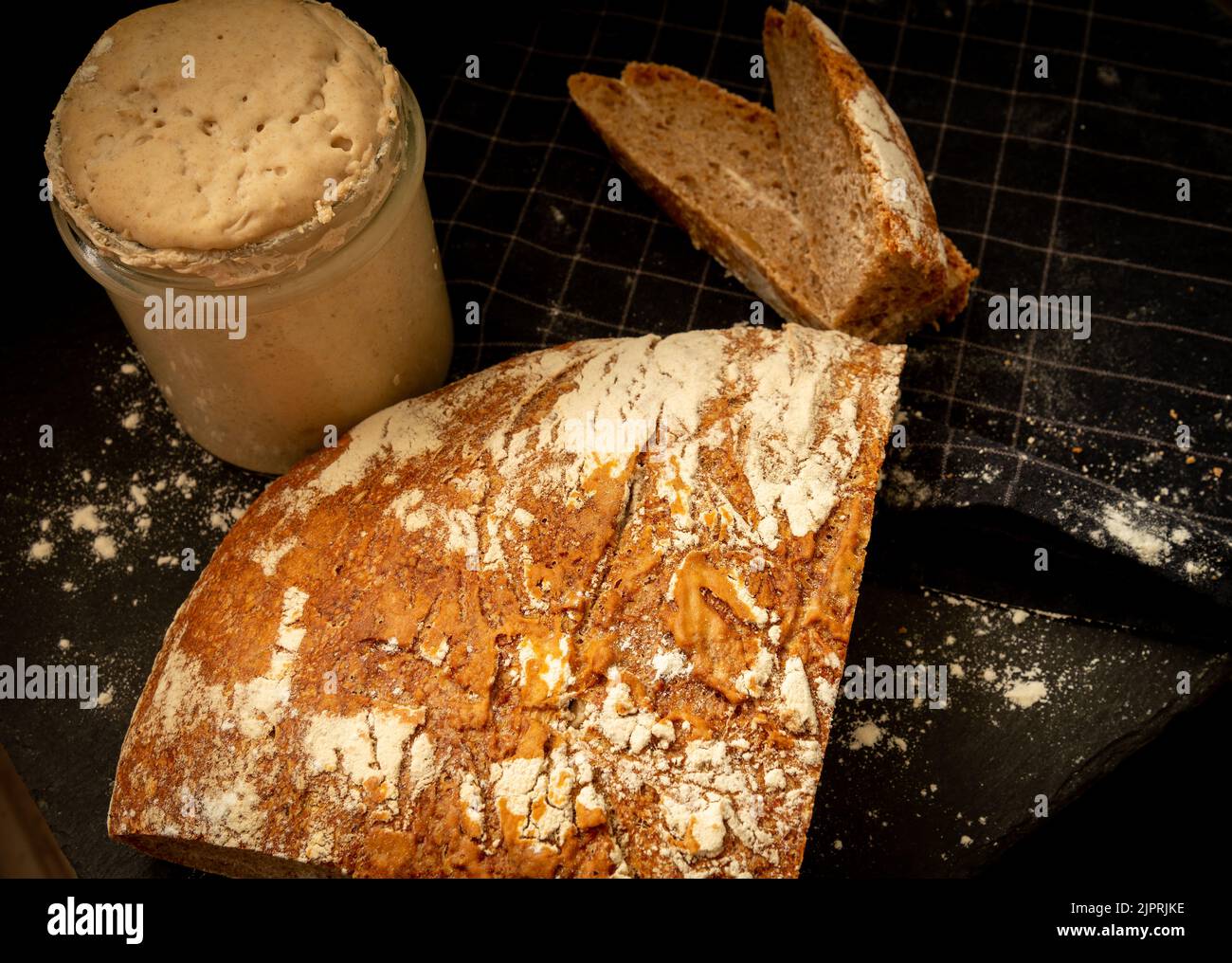 Loaf of artisan wheat and rye bread with graham flour. Sourdough