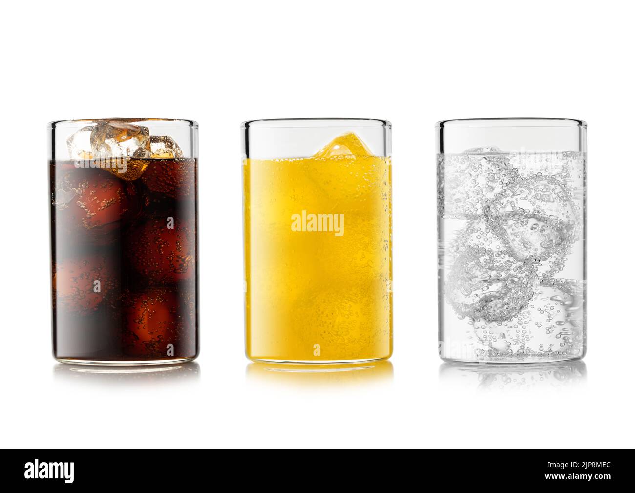 Cola soft drink with orange and lemonade soda with ice cubes and bubbles on white. Stock Photo