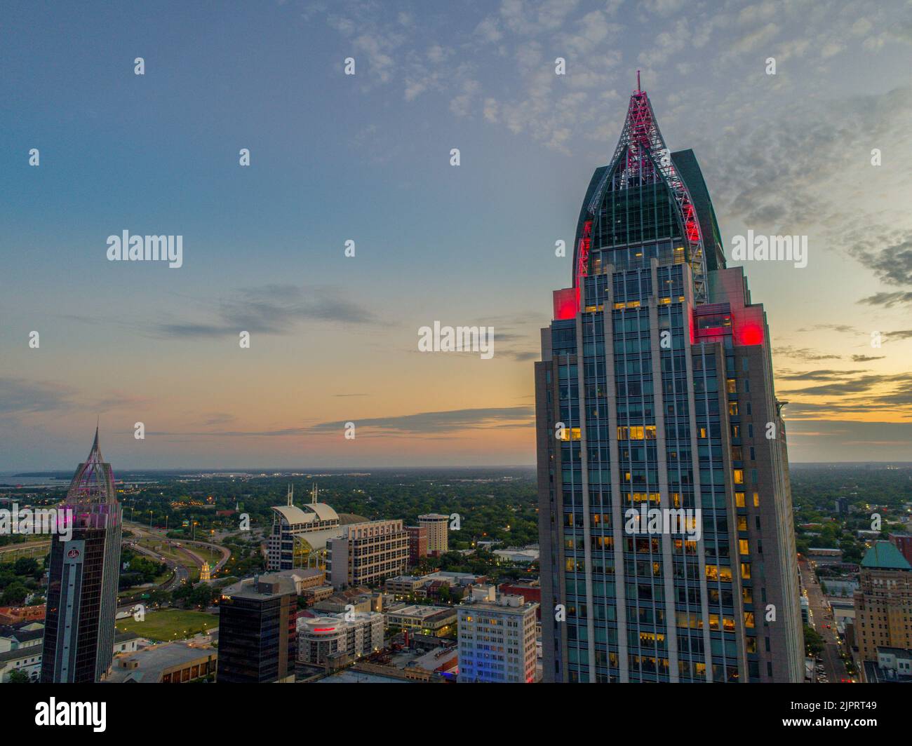 The downtown Mobile, Alabama waterfront skyline at sunset Stock Photo