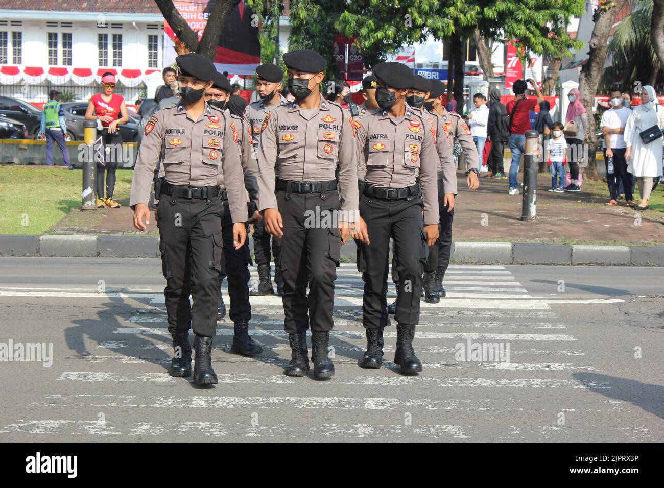 Police Patrolling Around State Palace and National Monument during 77th  Indonesian Independence Day Celebration Stock Photo